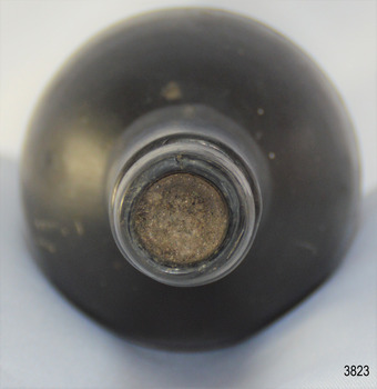 Bottle mouth is sealed.