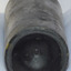 Narrow heel, deep pushed up base, pontil mark in centre. Body has bumpy texture.
