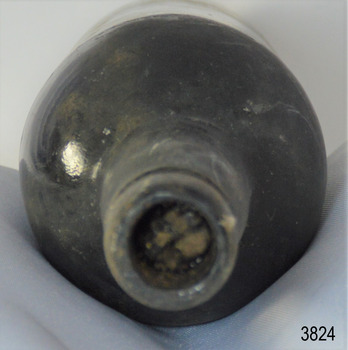Bottle is sealed with a damaged cork