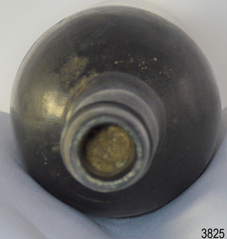 Mouth is sealed with a cork