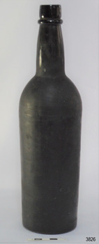 Black glass, cylindrical, bulbous neck