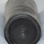 Narrow heel, deep pushed up base, pontil mark in centre. Body has bumpy texture.