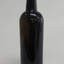 Tall slim bottle, dark glass, shiny surface