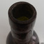Lip has lines formed curing application. 