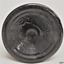 Bottle base has pontil mark and embossing, plus over-embossing.