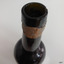 Top of lip has faults from application. There is a rectangular mark on the upper side of lip.