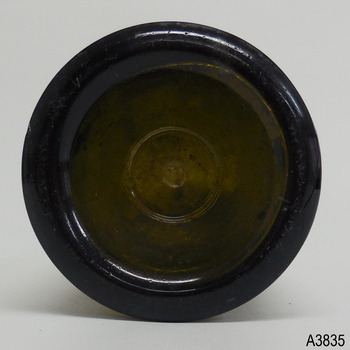 Base is thick around the heel. Pontil mark in centre with a ring around it in the glass.