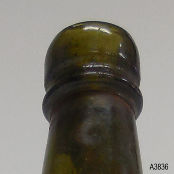 Slight twist lines can bees seen in the glass around the lip.