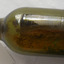 Ripples and diagonal lines can be seen in the glass.