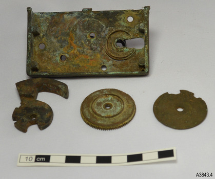 Brass has patination and corrosion.