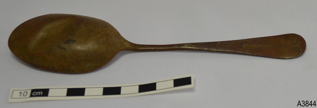 Spoon bowl has dents and discolouration. Handle has embossed inscription.