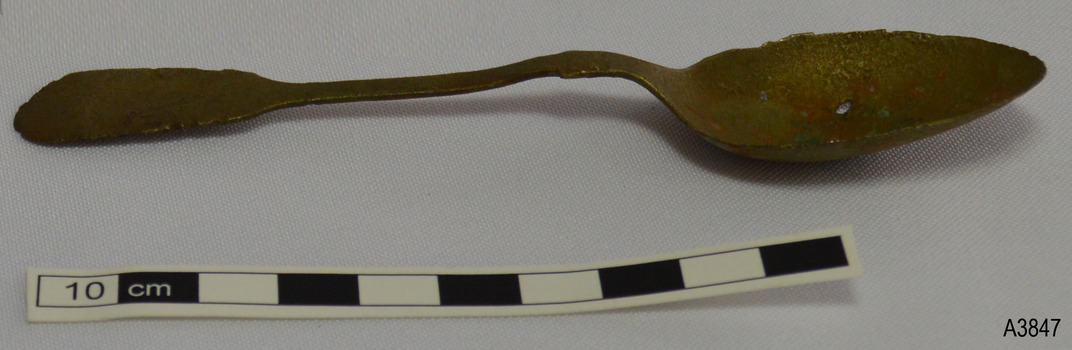 Spoon has discolorations, hole in bowl, nicks in rim, upwards bow in shoulder