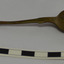 Spoon is discoloured to brown, has a cut in the bowl and is dented