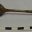 Spoon's neck has a curved shape just below the collar. Some shiny metal remains. Embossed marks on end of handle.