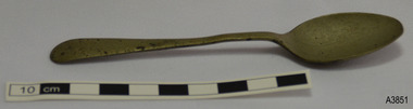 Spoon has a silver-bronze colour with black marks on the surface