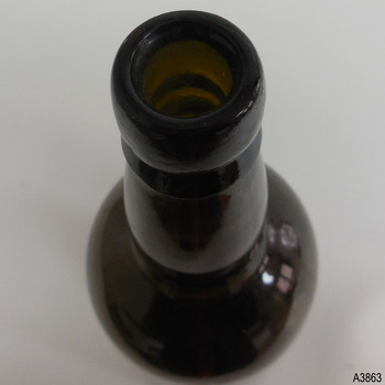 Bottle's bulbous neck is clear to see, and its double lip.