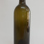Tall slim cylindrical bottle, dark green glass
