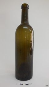 Tall slim cylindrical bottle, dark green glass