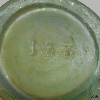 Inscription in shallow base is "133"