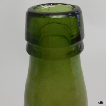 Bottle has double lip.