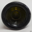 Base has thick heel and is pushed up, showing a wide innder circle mark.