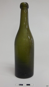 Bottle green, has smooth lines and is finished with a blob top