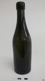 Dark olive glass bottle, tall and slim, wide collar, neck gently flares out to shoulder, body tapers inwards to base
