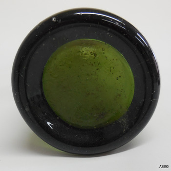 Heel of base is very thick. Glass has imperfections. Base is shallow.