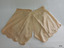 Beige silk with drawstring waist and scalloped finish to legs