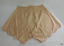 Beige silk drawers have scalloped legs and drawer string waist