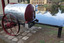 Wheel and tank ends are Painted crimson, shiny metal tank has black inscriptions.