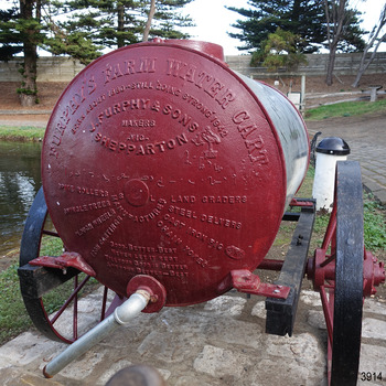 End has many inscriptions and images of stork and pig feeder. Outlet has pipe attached.