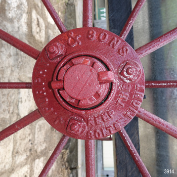 Inscription around hub has maker’s name and message to ‘keep the bolts tight’