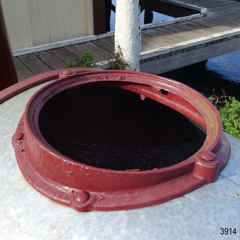 Inlet opening has a flange that is bolted onto the top of the tank