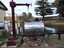 Pipe’s hose and tanks outlet pipe are in position, pump with handle ready to use