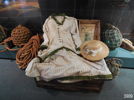 Garments of the period, displayed in open trunk