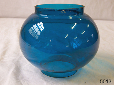 Blue glass lamp shade with bulbous body