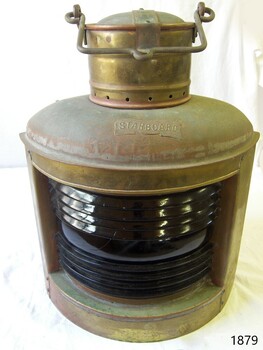 Navigation lamp, brass with green rippled glass window and swing handle