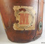 Label shows the shipping company's name in a circle and the red coloured letter "M" in the centre of the circle.