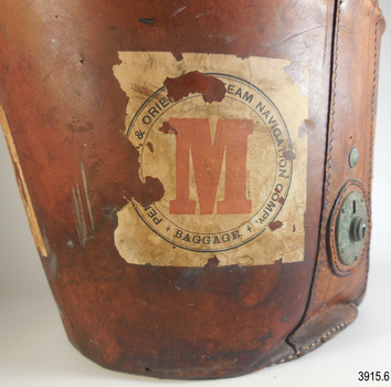 Label shows the shipping company's name in a circle and the red coloured letter "M" in the centre of the circle.