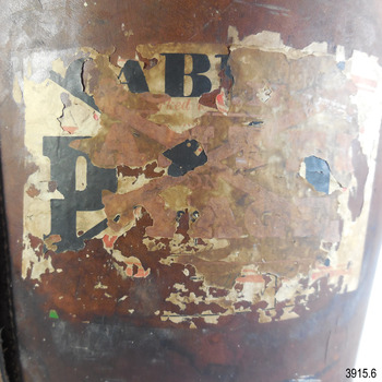 Label has an 'X'  across it and a "P" on one of the remnants. Another label appears to be underneath this one
