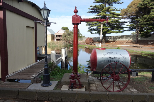 Standpipe in place with pump in front and Furphy Farm Water Cart beside it