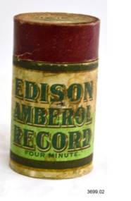Upright gramophone record cylinder with coloured print label