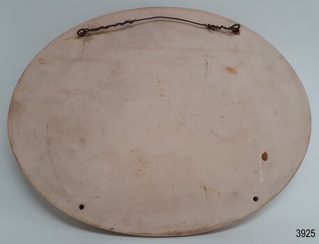 Plaster frame has 4 deliberate holes, tow of which have the hanging wire attached