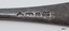Five stamped marks, four within various shapes.