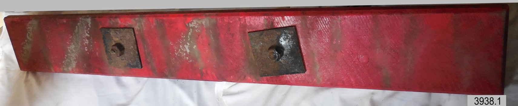 The square metal plates are bolted through the anchor' plank to the underside.