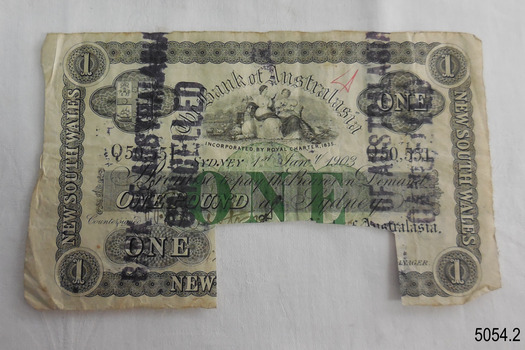 One-pound note printed in black with green. Cancellation stamp. Rectangular notch on bottom edge.