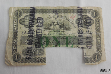 One-pound note printed in black with green. Cancellation stamp. Rectangular notch on bottom edge.