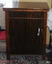 Cabinet folds up with worktop on top of the sewing machine table. Timer has decorative grain.