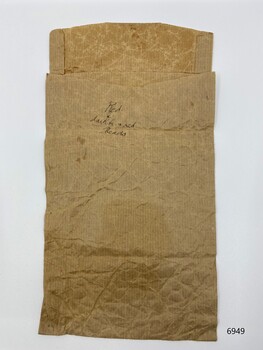 Reverse of a paper shopping bag from Pyott's, Vancouver Canada.